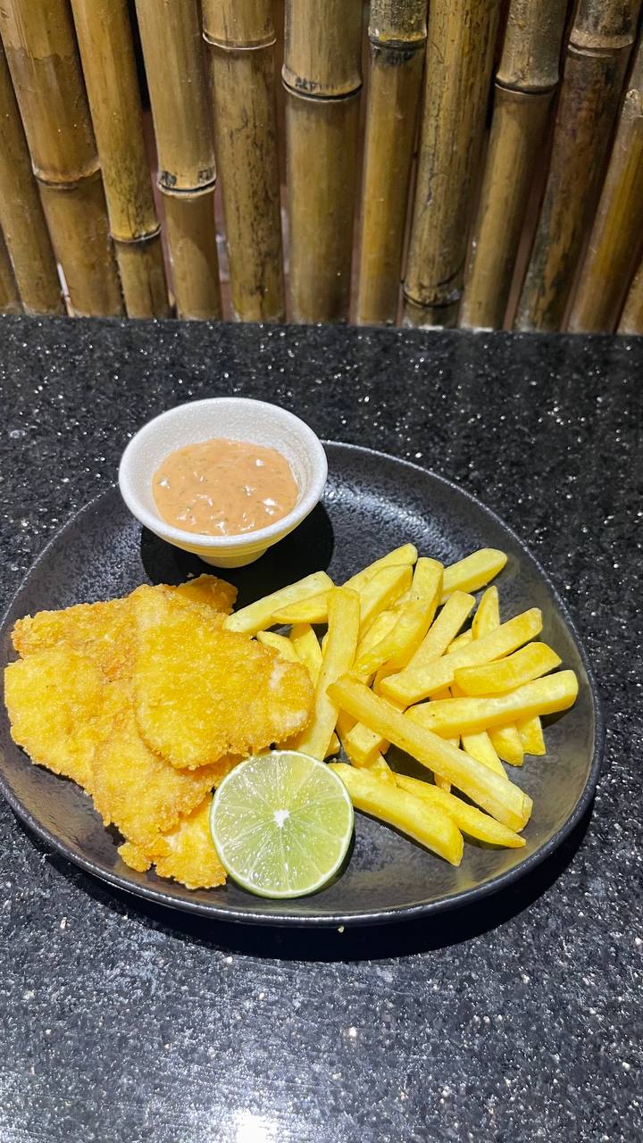 Chicken schnitzel with French fries.